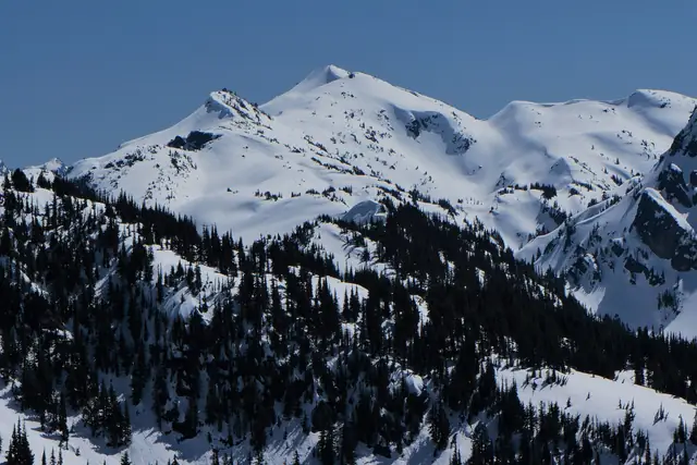 Snow-covered Granite Mountain seen from Mac Peak in April