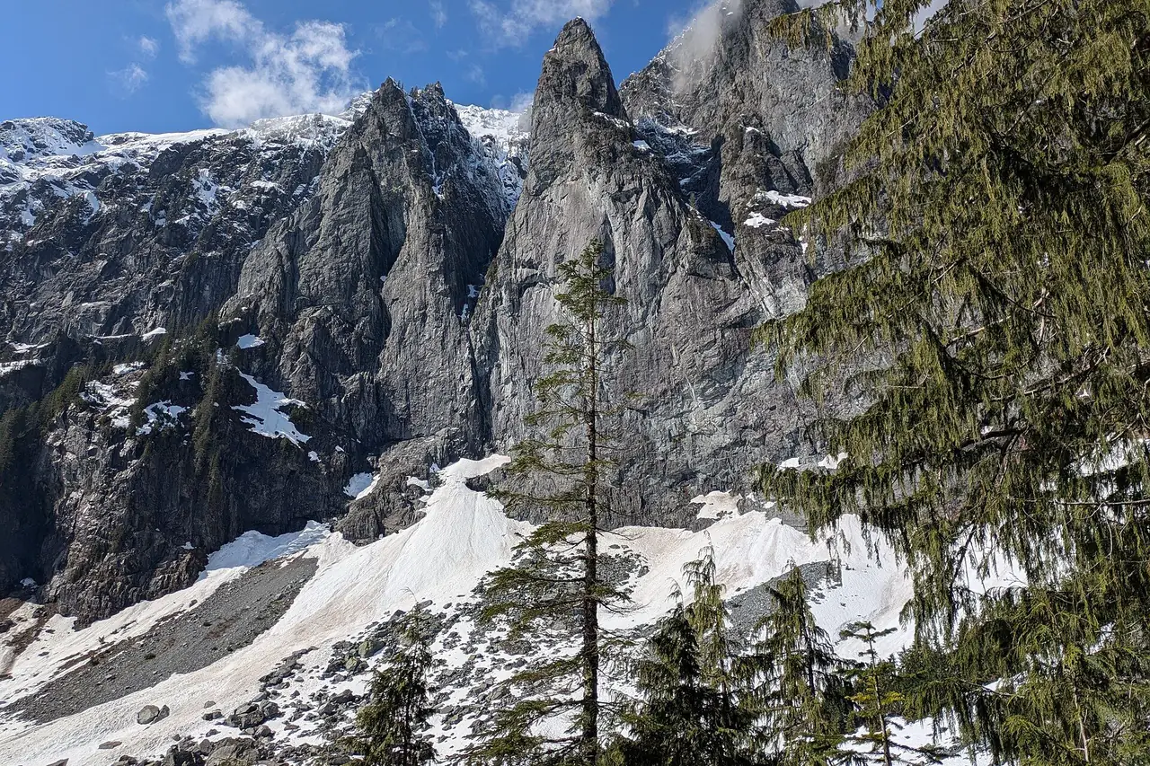 Snow-plastered cliffs above Lake Serene in April