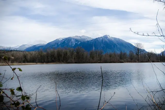 A snow-dusted Mt. Si across Borst Lake in February