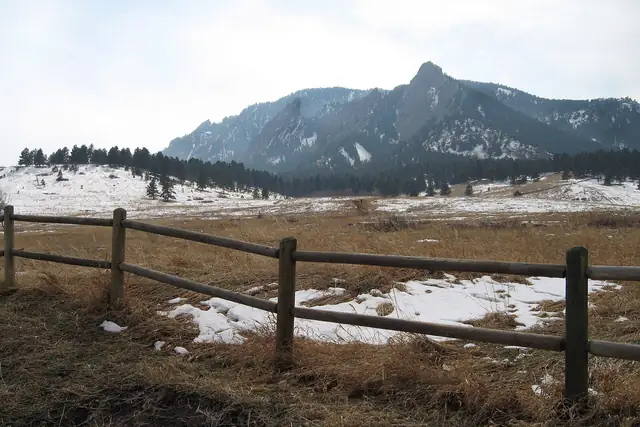 The Flatirons from Chautauqua Park with patchy March snow
