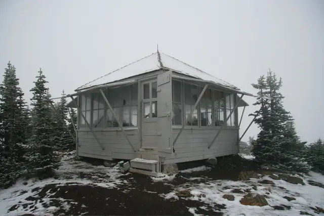 The Winchester Mountain lookout shuttered for winter under early-October snow