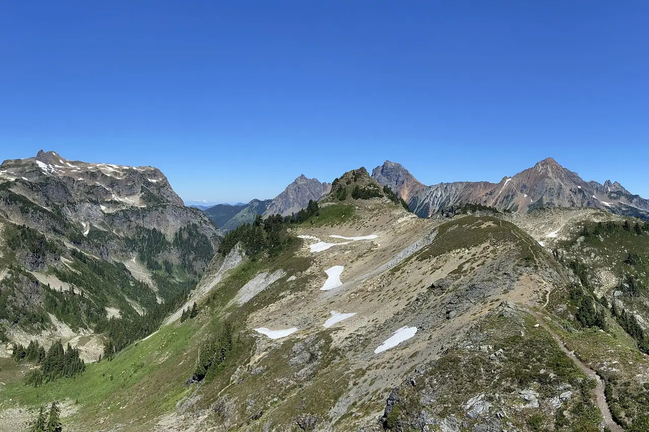 Yellow Aster Butte and its tarn-dotted plateau in August green